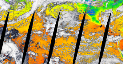 Satellite image of clouds over a technicolor version of the Pacific