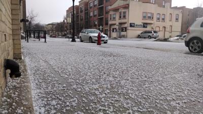 Photograph of street covered in hail