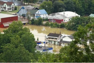 Flooded homes in Owego, New York after Tropical storm Lee. Image by Chris Waits, Flickr.